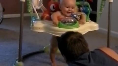 Baby Laughs at Dad