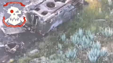 Ukrainian Tried to Hide Under a Burnt Armored Vehicle