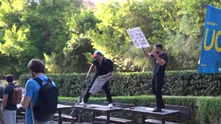 UCLA liberal throws hot drink at Jon Zherka for holding up ‘Trump > Biden’ sign