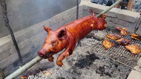 Roasted Pig on a Fire Pit.