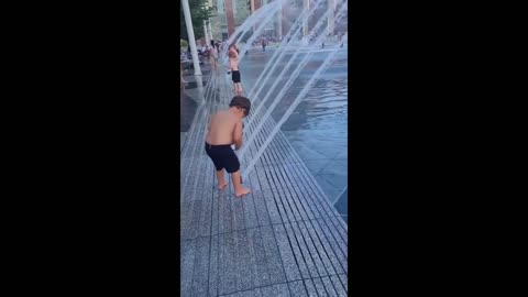 Clever kid uses water fountain to make his toy fly