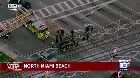 Police investigating after car collides with train in North Miami Beach