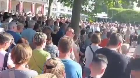 Thousands gather in the German park where 20yr old Polish/Greek migrant