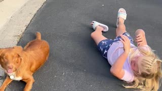 Girl and Dog Do Tricks Together