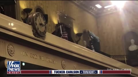 Jan. 6 footage shows Capitol cops escorting QAnon Shaman to Senate floor
