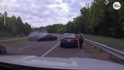 Virginia police officer almost killed by speeding car on busy roadway | USA TODAY