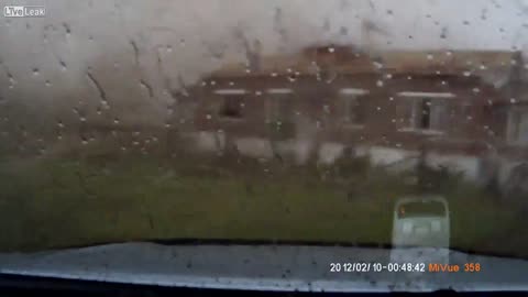 Scary Tornado in Russia - Car almost flys!