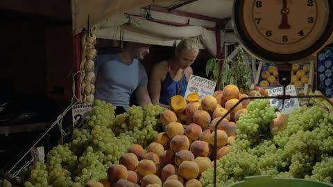 Choosing vegetables at a market