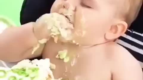 Cute Baby eating cake