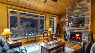 Relax and Unwind in a Cozy Hut with a Fireplace and a Snowy View