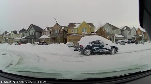 Driver Doesn't Bother to Wipe the Snow Off