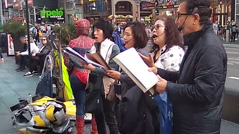 Singing hymns at 42nd Street and Broadway NY NY.