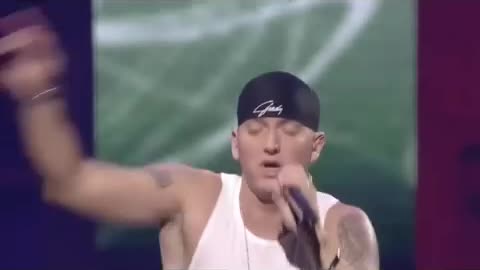 Eminem get emotional while singing mocking bird...