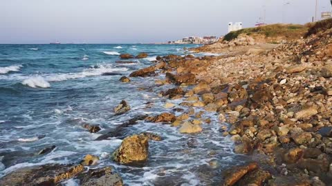 Strong Sea Waves Crashing The Rocky Shoreline