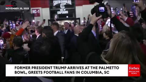Former President Trump Arrives At Palmetto Bowl In SC, Crowd Chants 'USA! USA!'