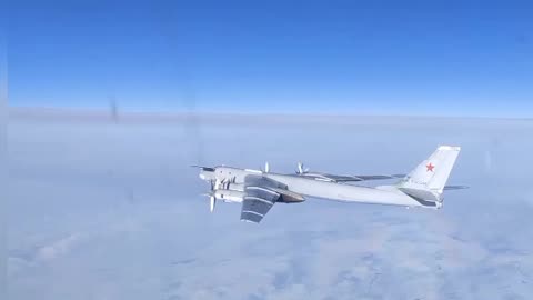 Two Tu-95MS strategic missile carriers conduct scheduled flight over Bering Sea