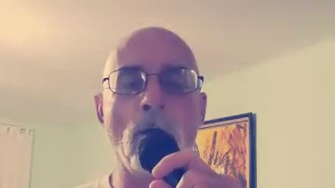 Singing "He Stopped Loving Her Today" by George Jones