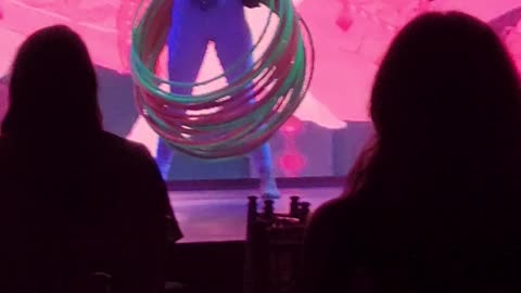 woman hula hooping with many hoops in Mexico