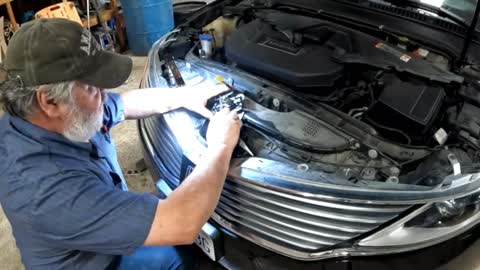 HOW TO OPEN A HOOD THAT WONT OPEN