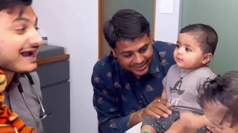 Doctor with child funny movement