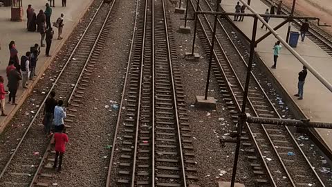 Extremely Crowded Train Pulls Into Station