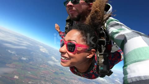 Beautiful Brazilian afro woman practicing skydiving.