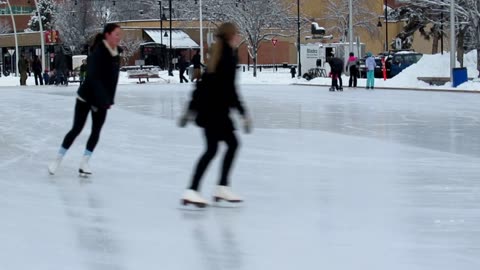 People Skating on Iced Over Street