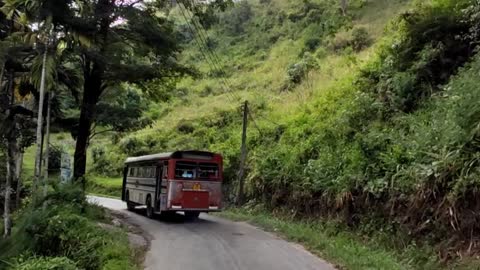 Sril Lankan bus through a beautiful landscape