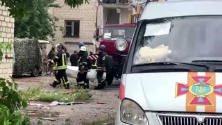 Rescuers dig for survivors in Donetsk rocket attack