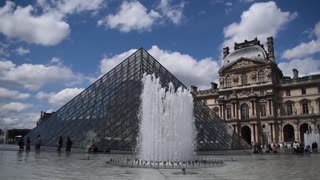 The Louvre in France On A Clear Day Water Display