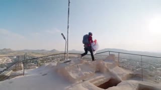 French athlete Valentin Delluc paragliding over breathtaking Capadocia, Turkiye