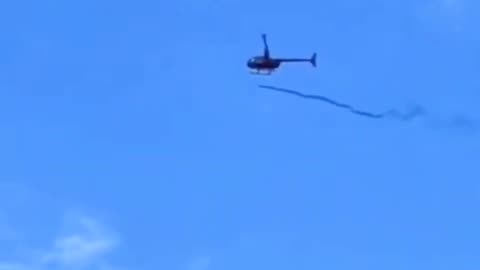 bill gates?-helicopter dropping mosquitoes in Florida