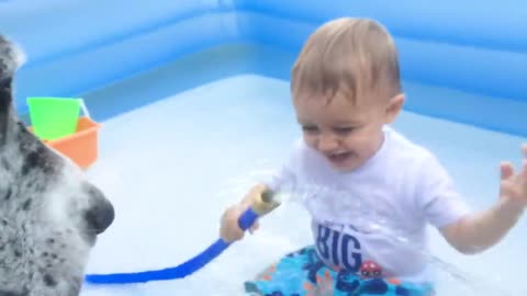 Funny Babies playing with Water