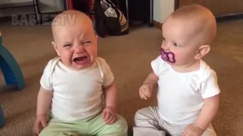 Funniest TWIN Baby Girls Fighting Over Pacifier