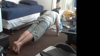 simple standard set of doing pushups, using my fists down into the floor