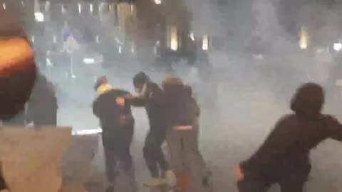 Police in Georgia use stun grenades to disperse crowd