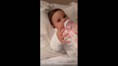 Adorable baby gets ready for bedtime