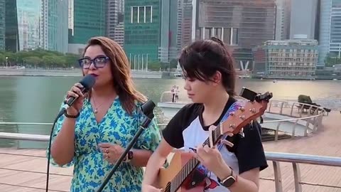 Meher Afroz Shaon....- as a Street Singer! at Marina Bay Singapore.