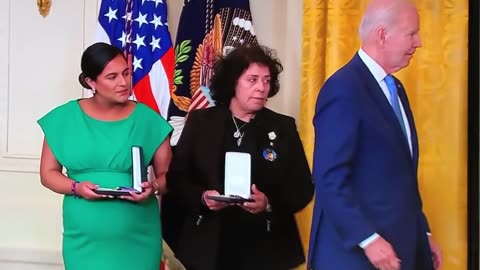 Woman literally ROLLS HER EYES at fumbling Biden during medal ceremony