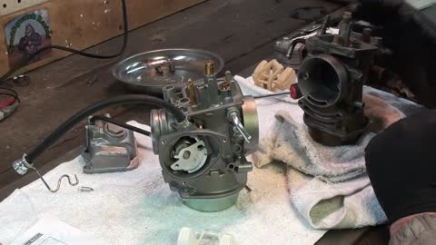 Carburetor rebuild on a Polaris Sportsman ATV 500 making 1 good carb out of 2