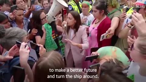 AOC escorted by police as she joins pro-abortion rights protests