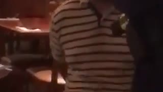 Handcuffs guy in restaurant falls over backwords in chair