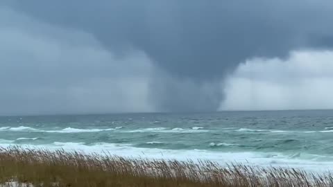 Massive waterspout captured on camera forming over the gulf