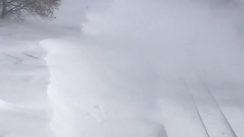 Train Travels Through Massive Snow Drift