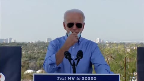 Biden removes his mask to cough in his hand