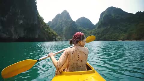 Woman Kayaking In Halong Bay