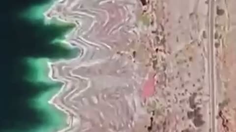 Dead Sea pond turns RED