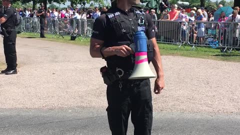 Cheerful Policemen Entertain Crowd While Waiting For Royal Newlyweds