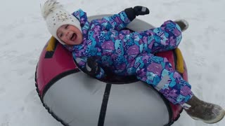 Riding on a donut in the winter