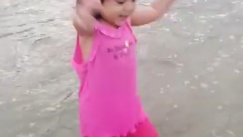 Baby first time go to beach